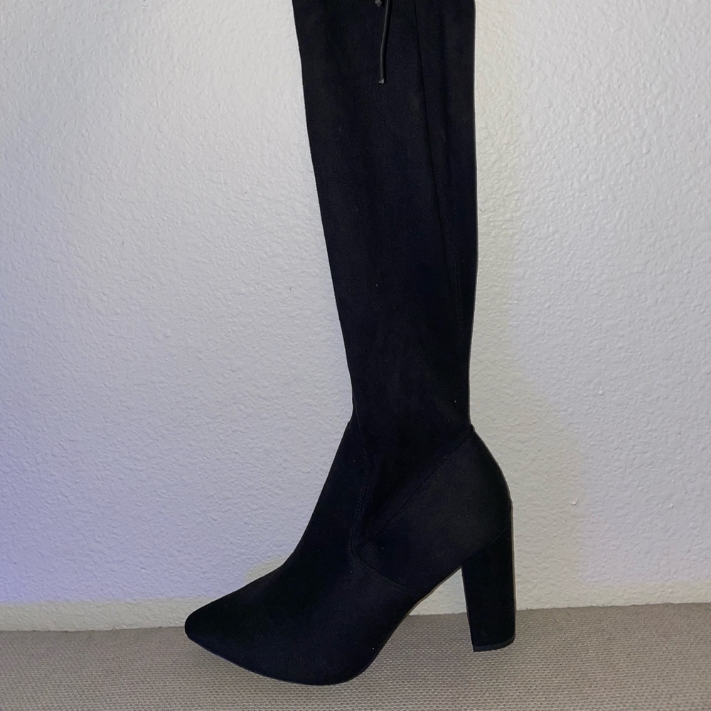 Over the knees black boots